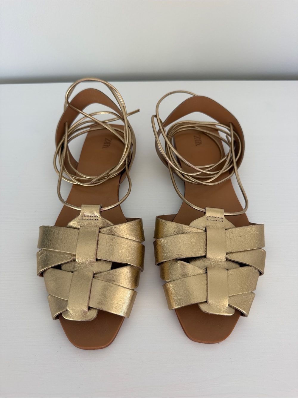 Zara Metallic Gold Woven Lace-Up
Flat Sandals